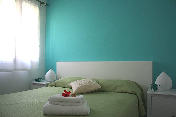 Villa-mediterranea-grünes-schlafzimmer