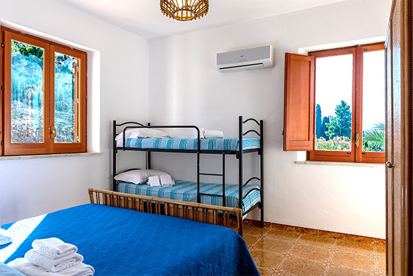 Villa-flora-schlafzimmer-bett